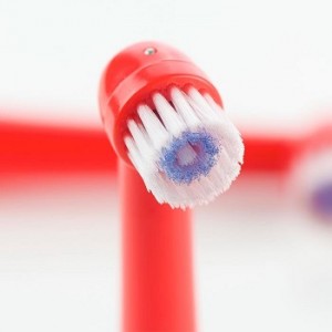Photo of a red power toothbrush