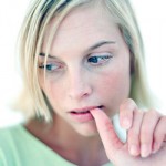 photo of a woman looking thoughtful