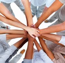 photo of hands making a supportive circle