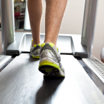 Photo of feet walking on a treadmill