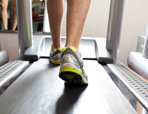 Photo of feet walking on a treadmill