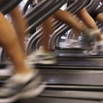 Photo of feet running on a treadmill