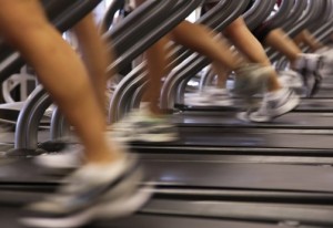 Photo of feet running on a treadmill