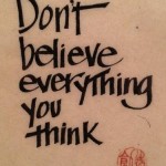 Photo of a poster saying don't believe everything you think