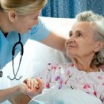 photo of an older woman in a hospiital bed