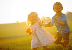 Photo of children playing in the sun
