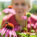 photo of a women in a field of flowers