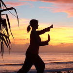 photo of a woman pracicing tai chi