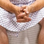 ph0to of a man waiting for a prosate exam