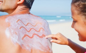 photo of a man wearing suncream